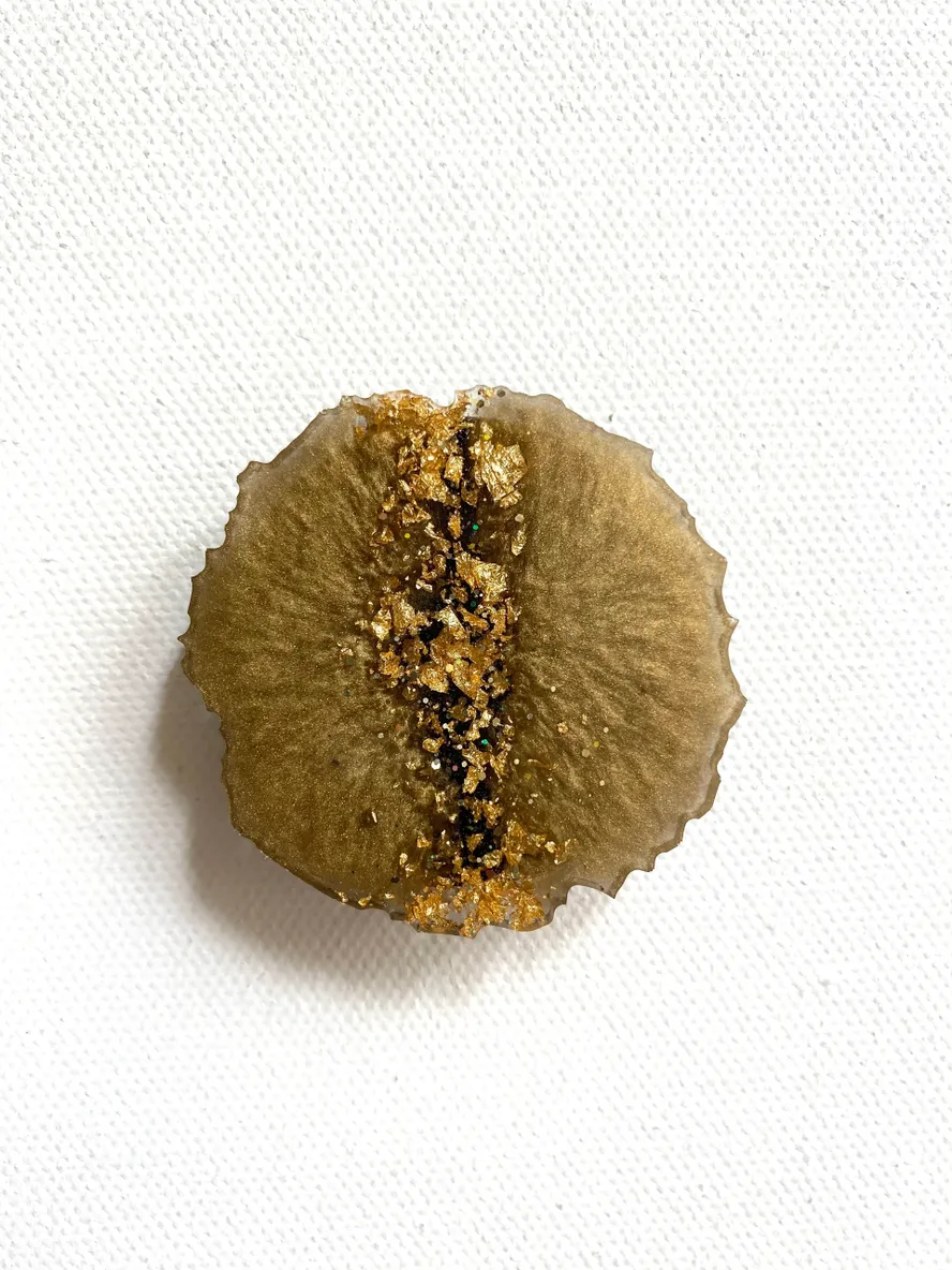 A close up of an apple core on a table