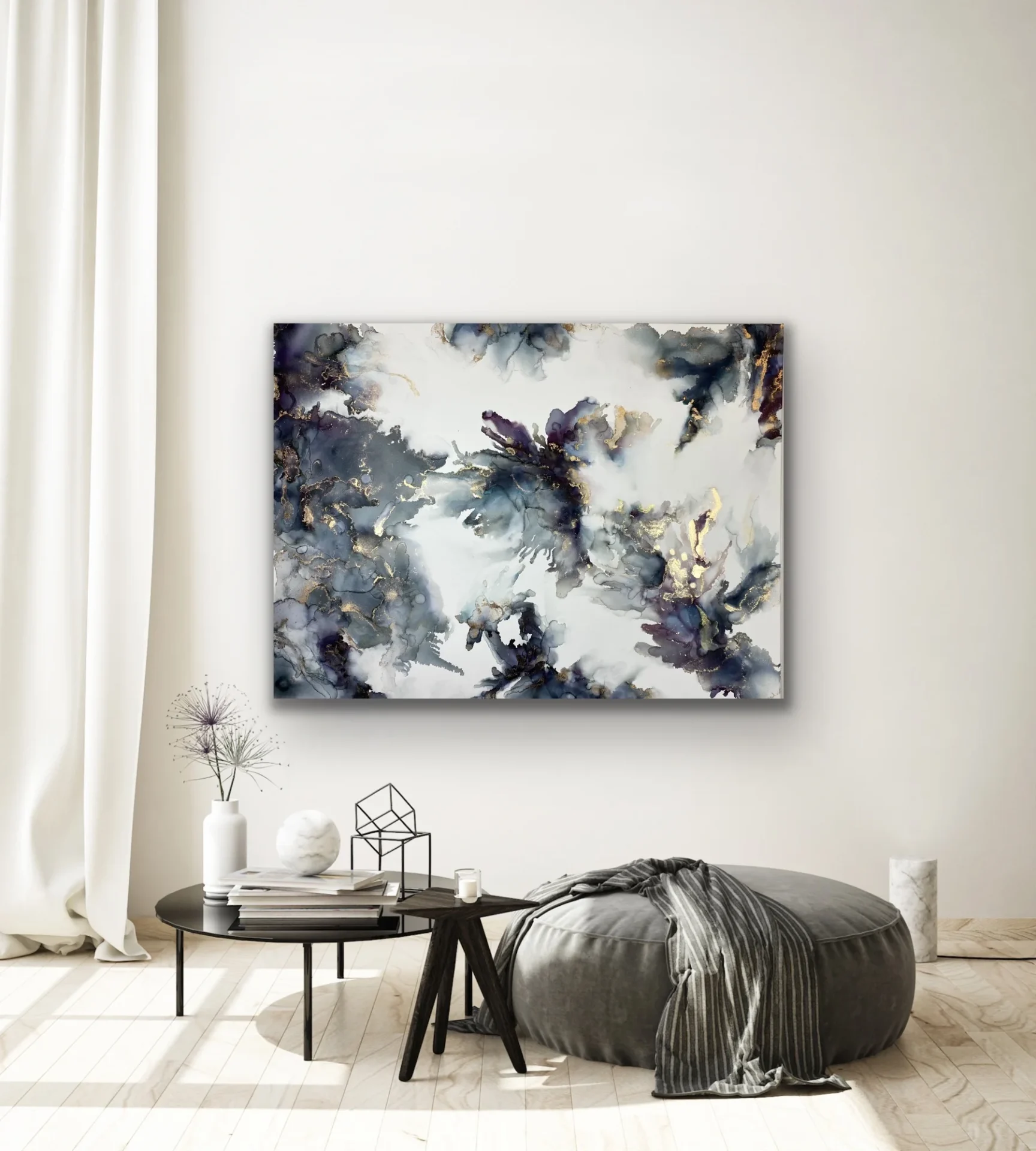 A painting of flowers on the wall in a room.