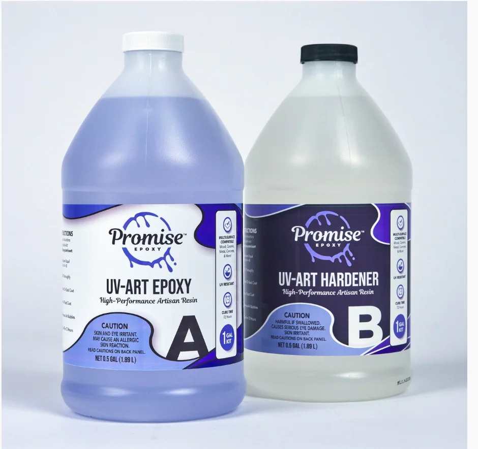 Two bottles of uv-art epoxy and a bottle of uv-art handyner.