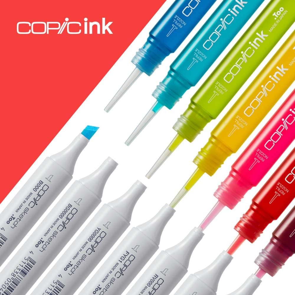 Vibrant Copic alcohol ink markers in various colors with precision tips displayed against a red and white background.