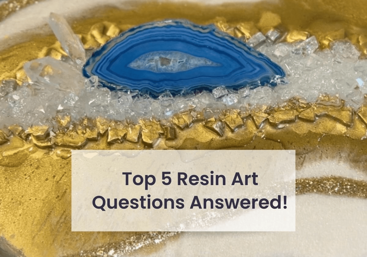 Discover the answers to the ‘Top 5 Resin Art Questions’ with our latest blog post, featuring a stunning close-up image of a resin art piece. This visual guide captures the intricate details of a geode resin art project, highlighting vibrant blue hues encased in glossy epoxy resin, accented by shimmering gold leaf and crystal clear quartz clusters. The captivating texture and depth showcase the beauty of resin art, perfect for DIY enthusiasts and crafters looking to explore this medium. Dive into our blog for expert advice and step-by-step guidance on creating your own resin masterpieces.